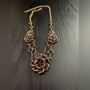 Beautiful purple flower gold tone necklace. Never worn.
